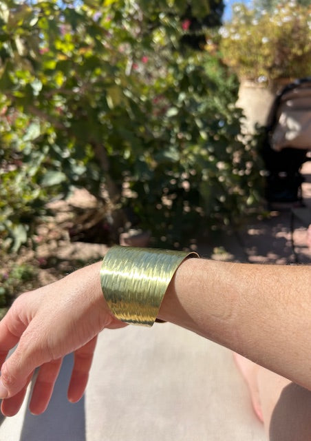 Gouden armband breed