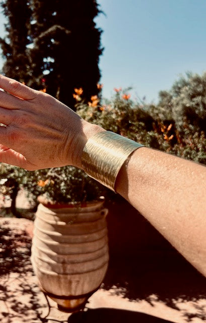 Gouden armband breed