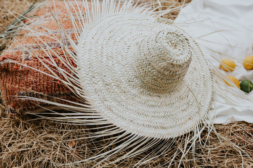 Decoratieve palmblad hoed