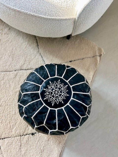 Ronde lederen poef zwart