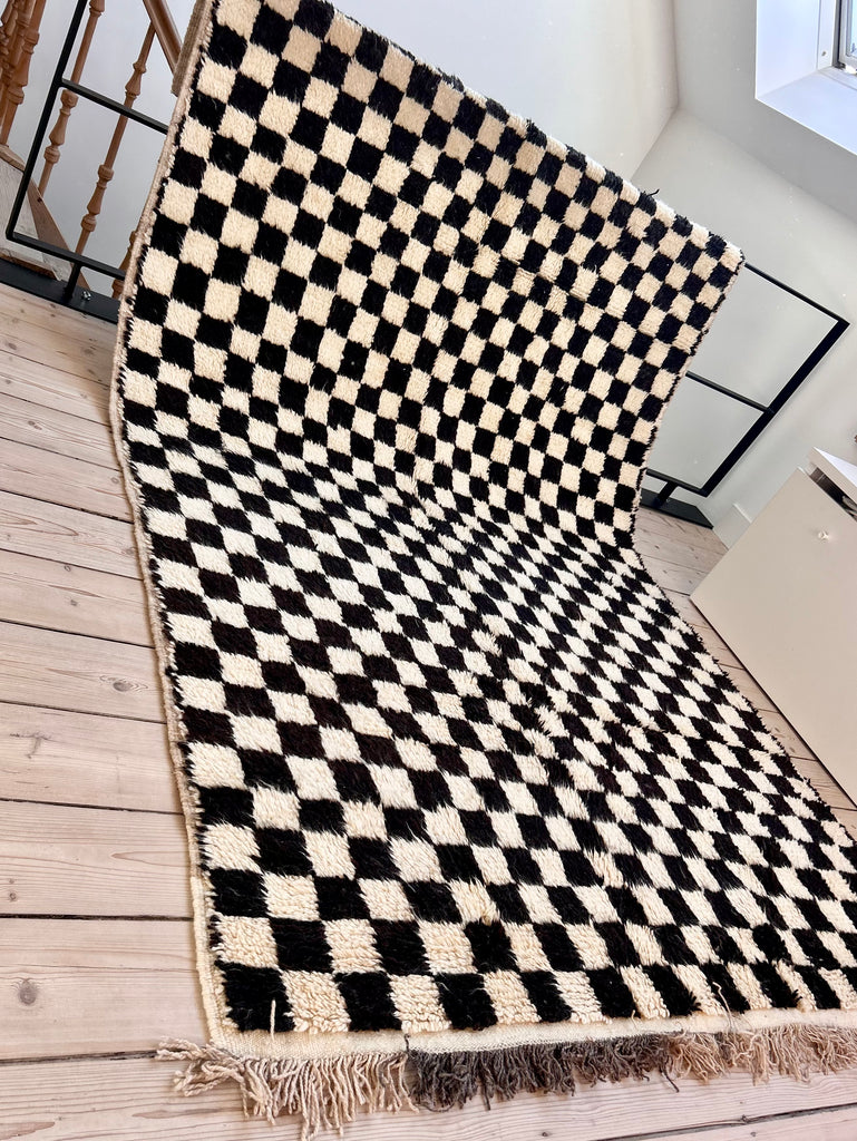 Checkered tapijt Radia