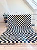 Checkered tapijt Radia