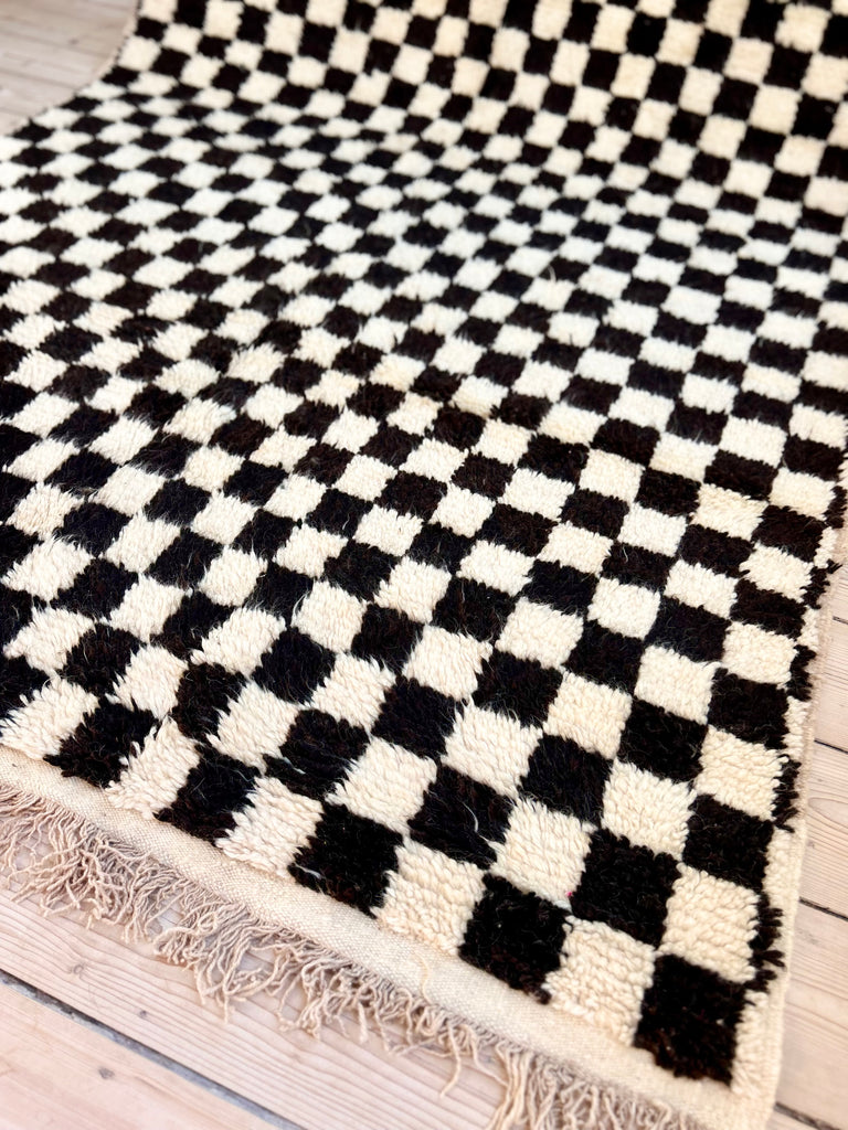 Checkered tapijt Radia