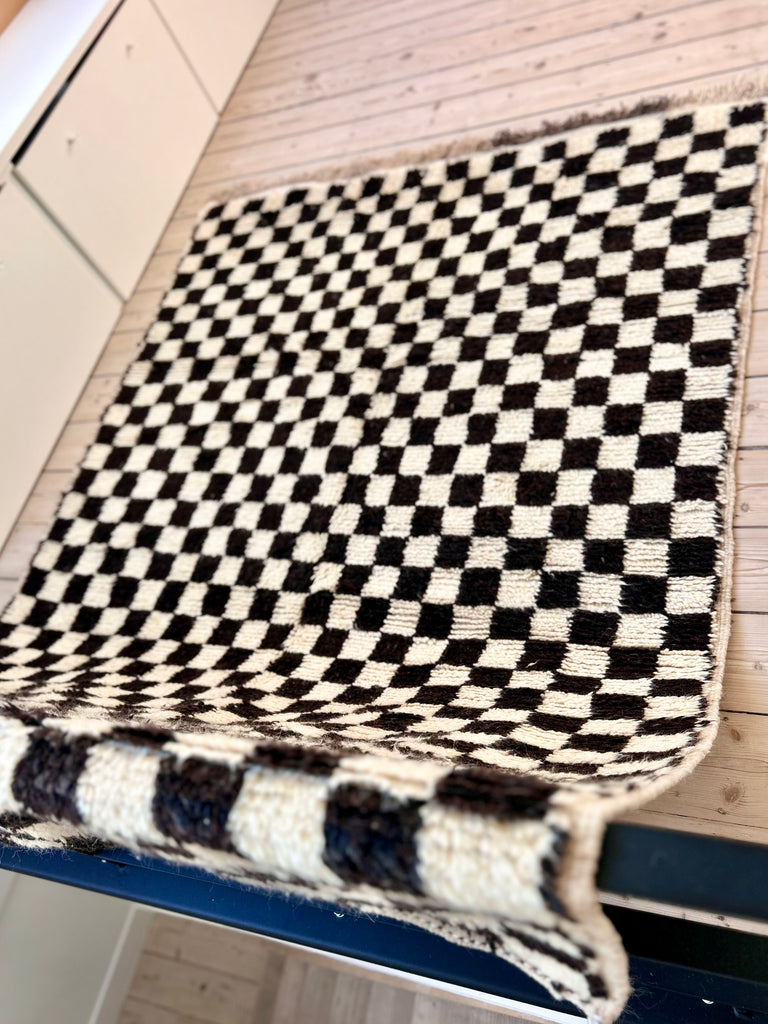 Checkered tapijt Radia