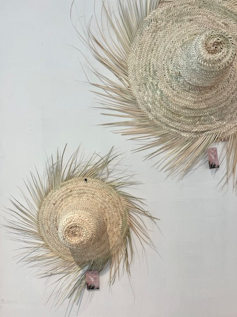 Decoratieve palmblad hoed